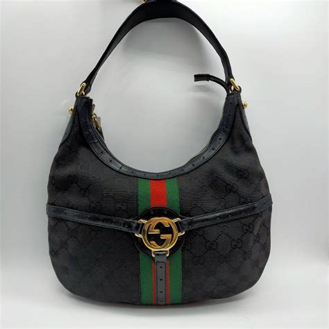 borsa gucci sacca con cerchi dorati|borse Gucci donna farfetch.